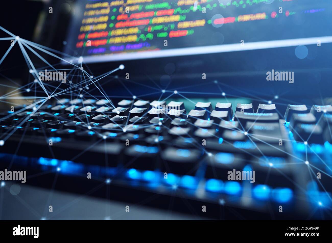 Computer of a programmer with lines code of software Stock Photo
