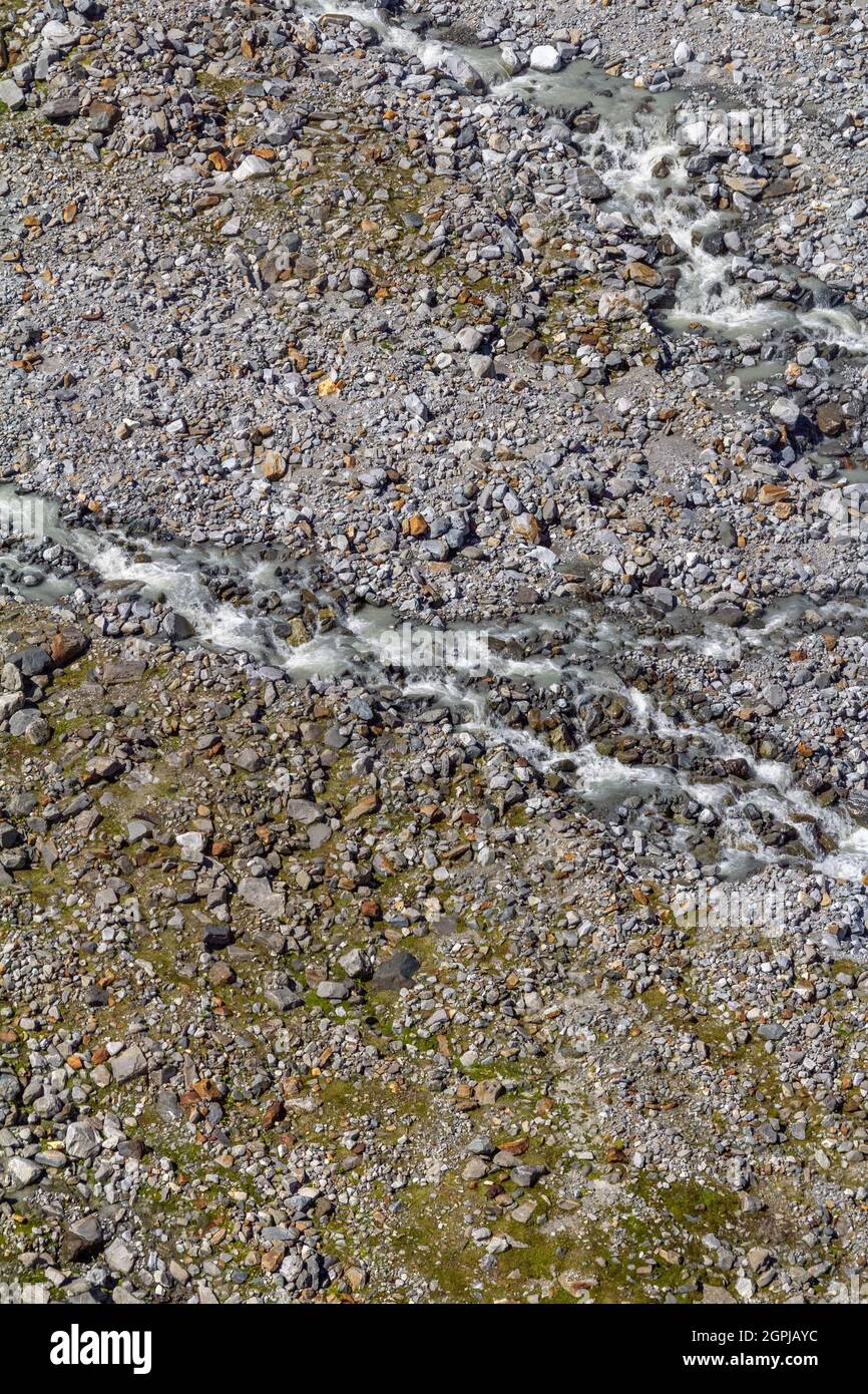 High angle detail including some flowing meltwater around the Stubai Glacier near the Stubaital, a alpine valley in Tyrol, Austria Stock Photo
