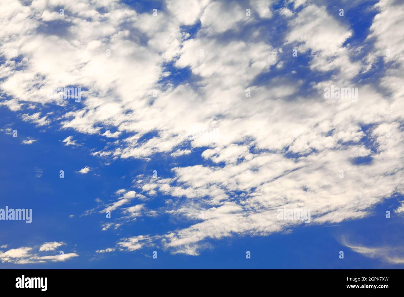 Blue sky with Altocumulus clouds in the daytime Stock Photo - Alamy