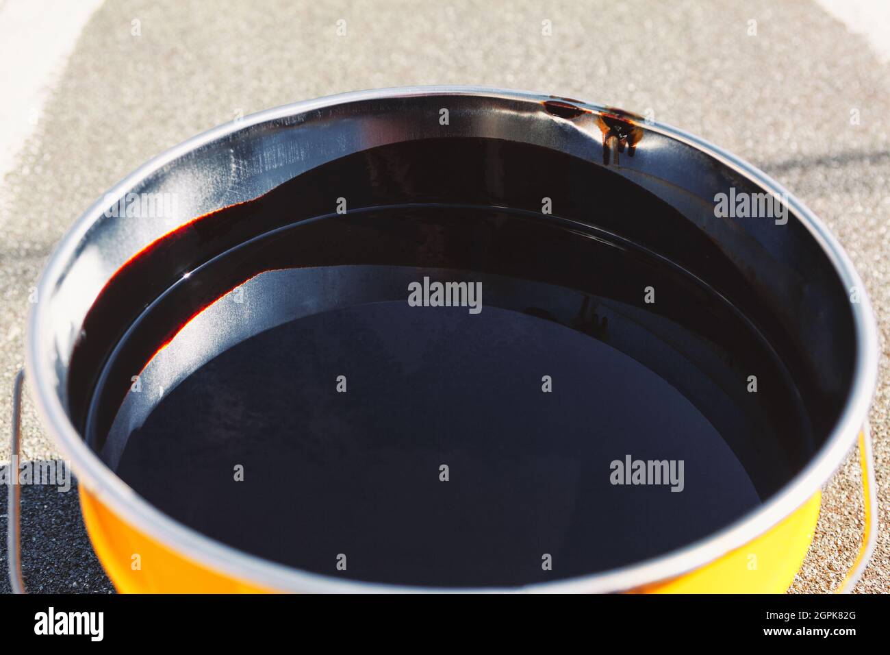 Bucket of mastic . Roof waterproofing resin Stock Photo Alamy