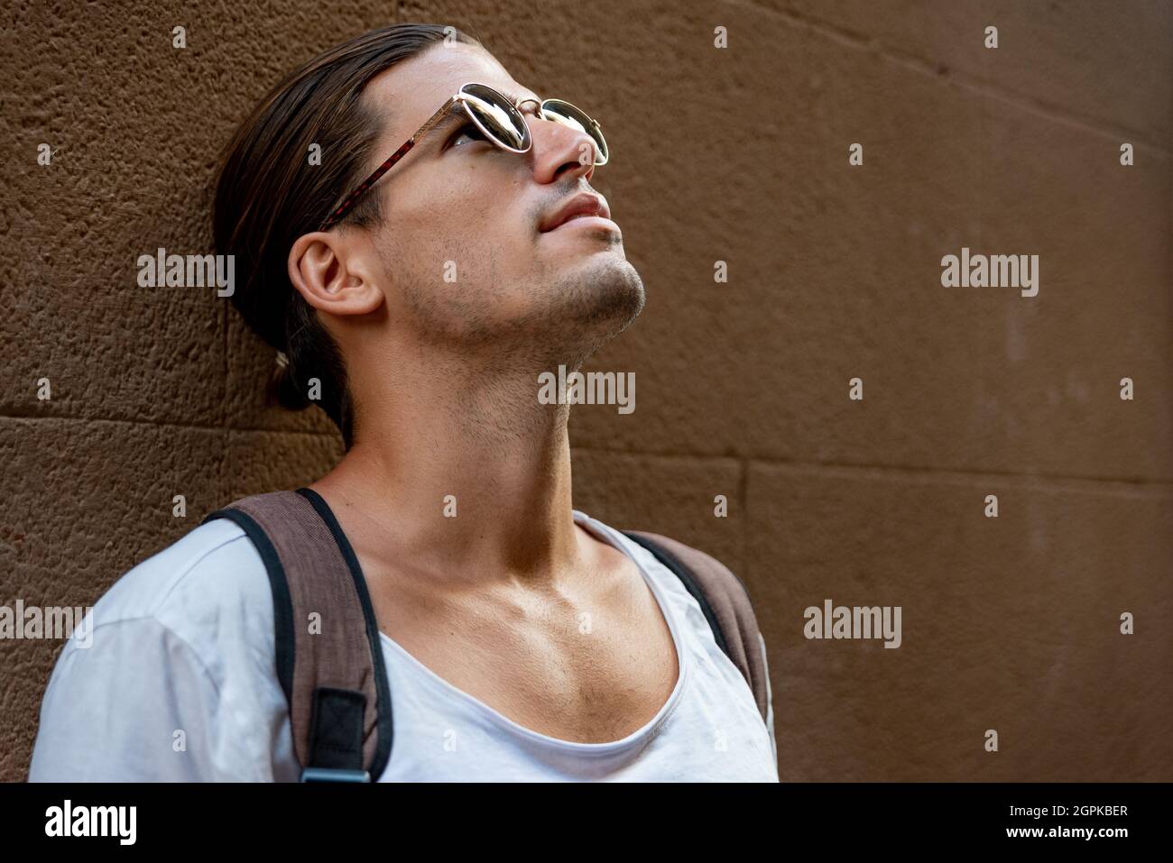 Portrait of young latin man with sun glasses Stock Photo