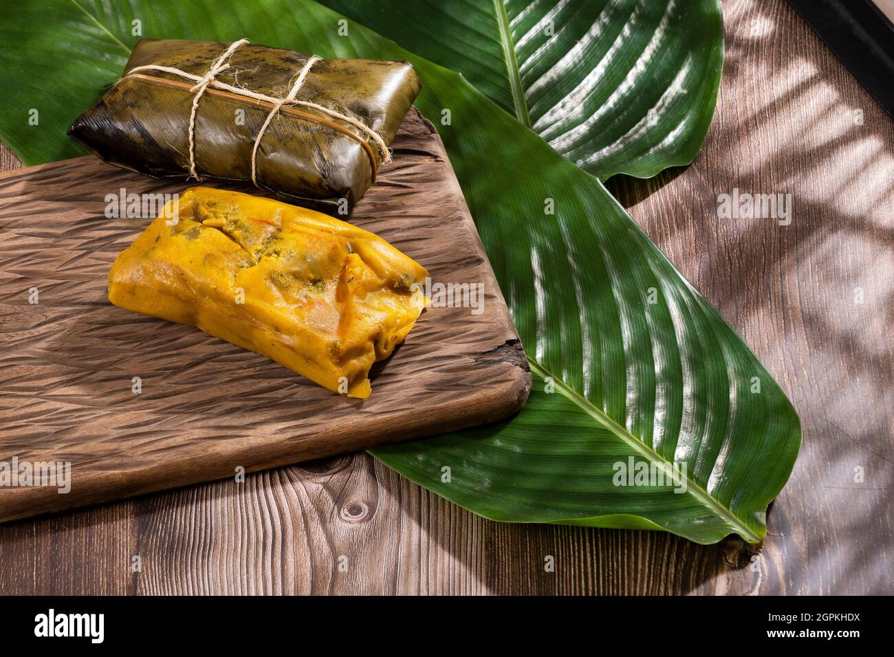 Tamale Typical Colombian Food Wrapped In Banana Leaves Stock Photo Alamy