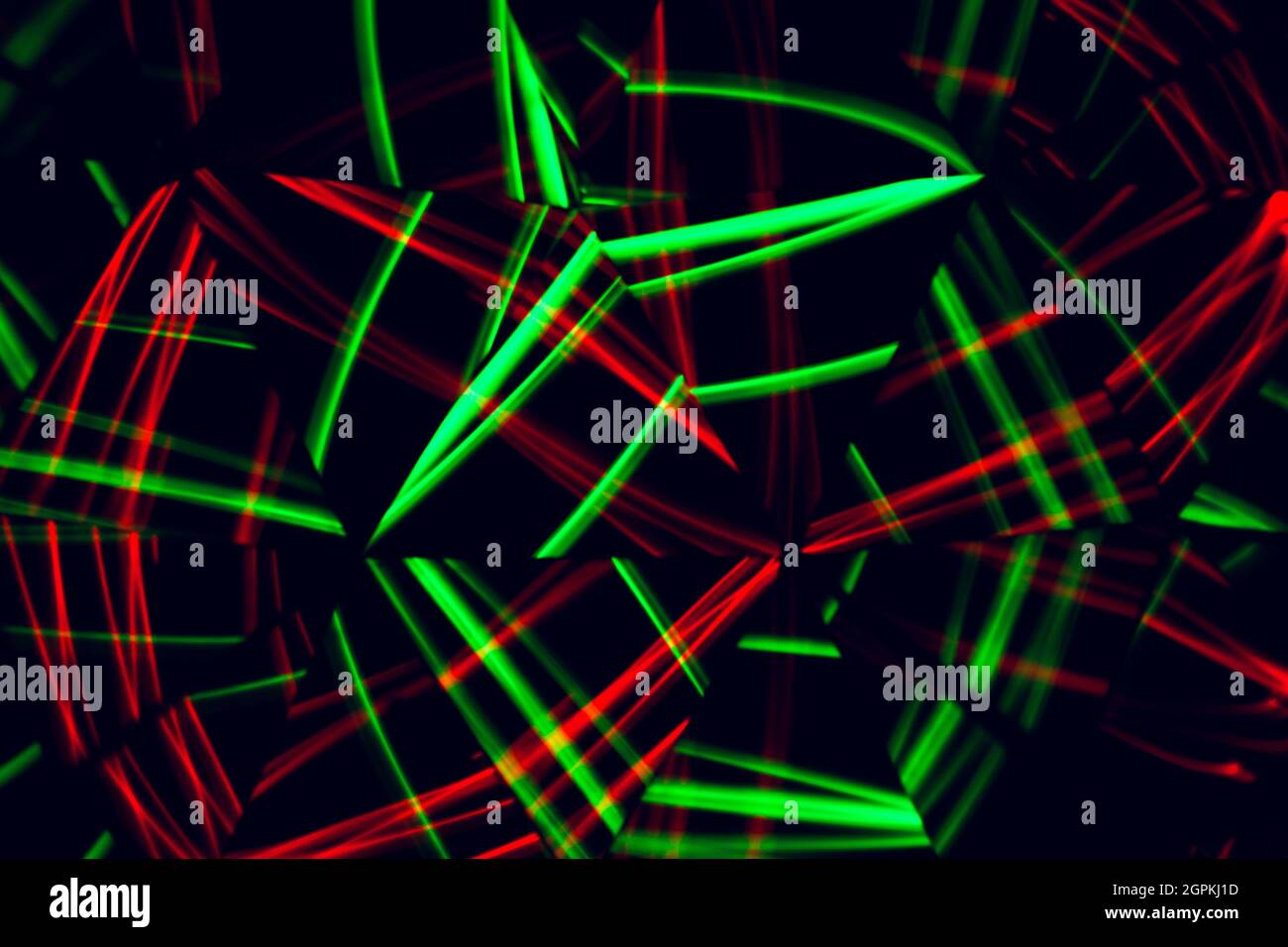 Abstract patterns of green and red colors. Colored lights in a long exposure light-painting photograph. Stock Photo