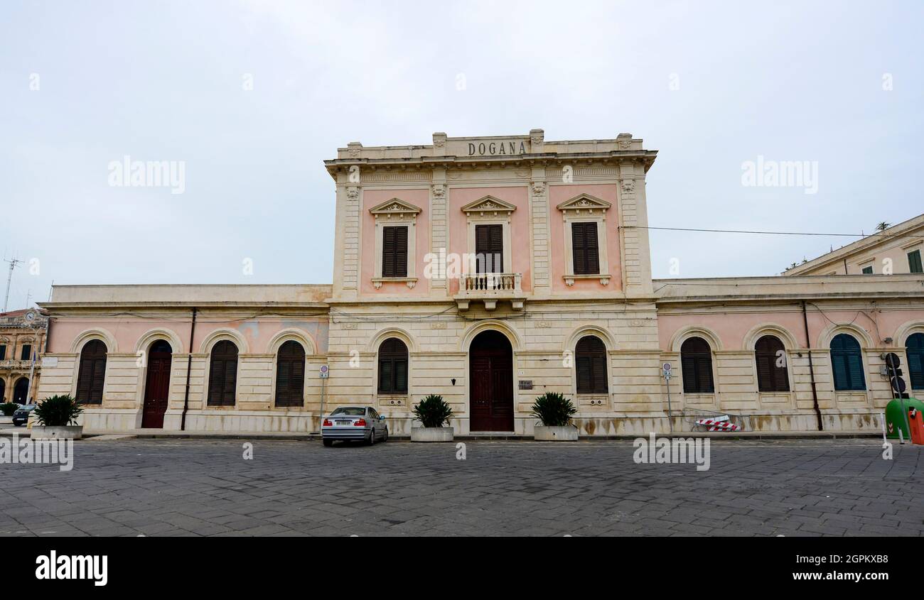 Customs and tax building in Syracuse, Italy. Stock Photo