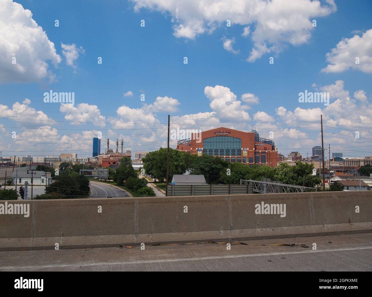 INDIANAPOLIS, INDIANA - JULY 8, 2018: Lucas Oil Stadium, home of the Indianapolis Colts football team, surrounded by dowtown Indianapolis, is viewed f Stock Photo