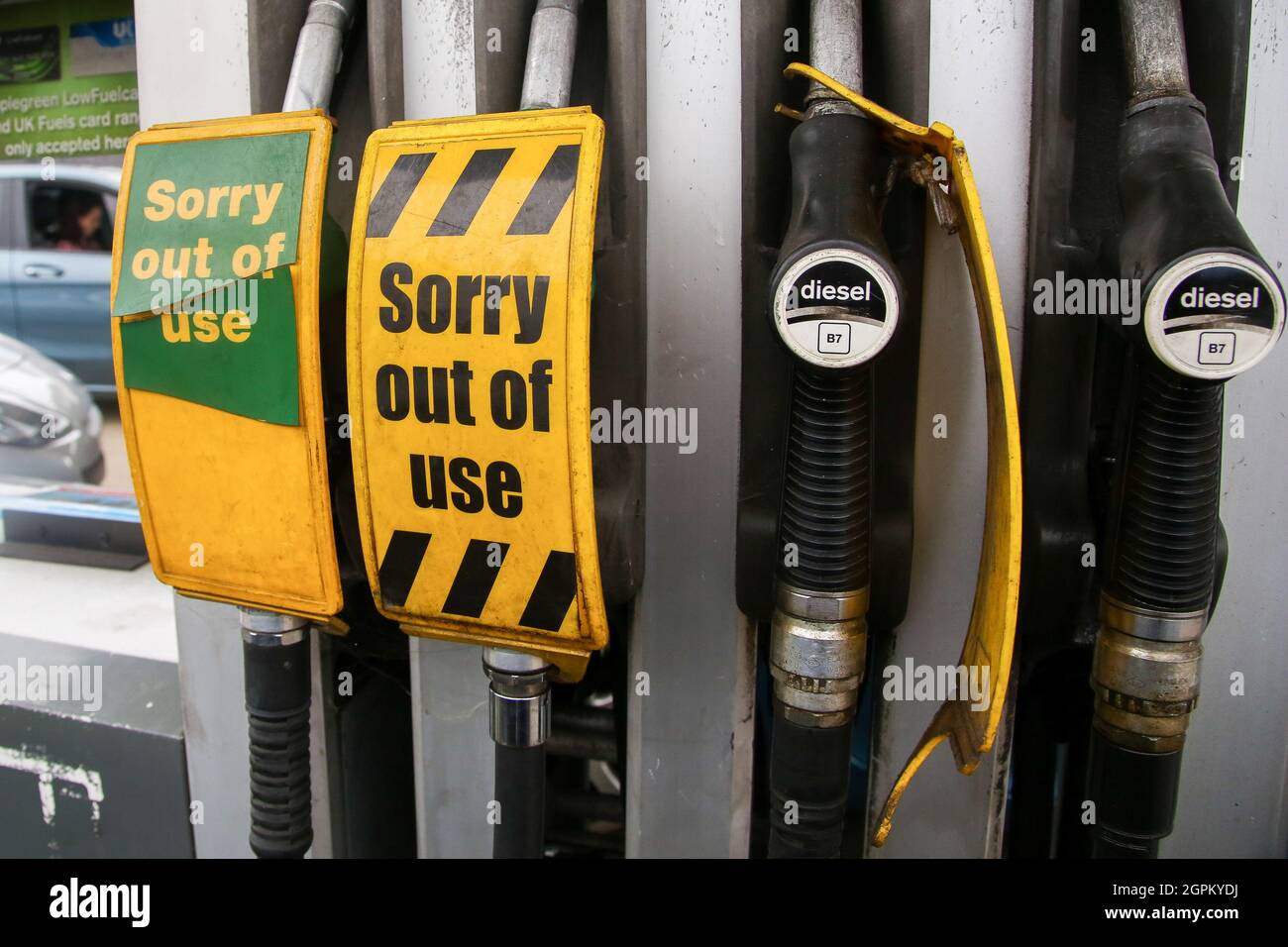 A 'sorry out of use' sign at a petrol station as motorists continue to panic buying fuel, amid fears of fuel running out due to a shortage of HGV (Heavy Goods Vehicle) drivers. Stock Photo