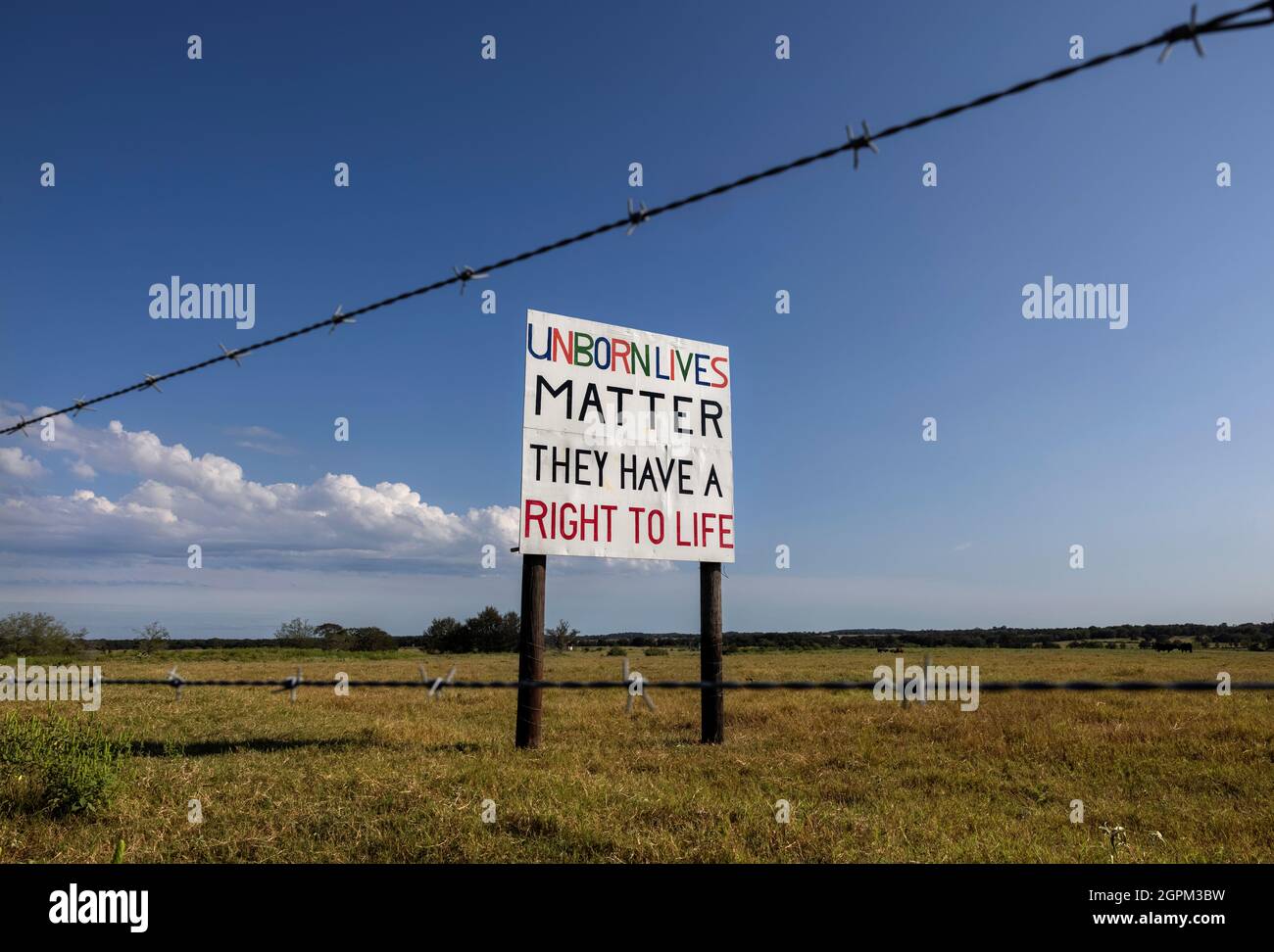 A handmade anti-abortion sign faces a stretch of highway outside of Austin nearly a month after Texas enacted the strictest anti-abortion law in the United States, September, 29, 2021. REUTERS/Evelyn Hockstein Stock Photo