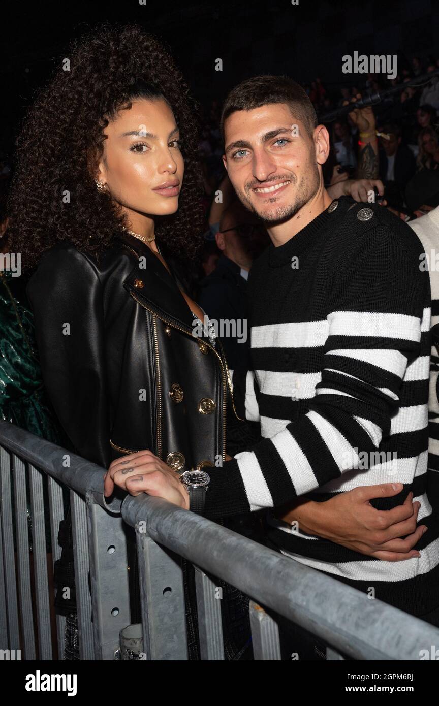 Marco Verratti and his wife Jessica Aidi attend the Balmain Festival as