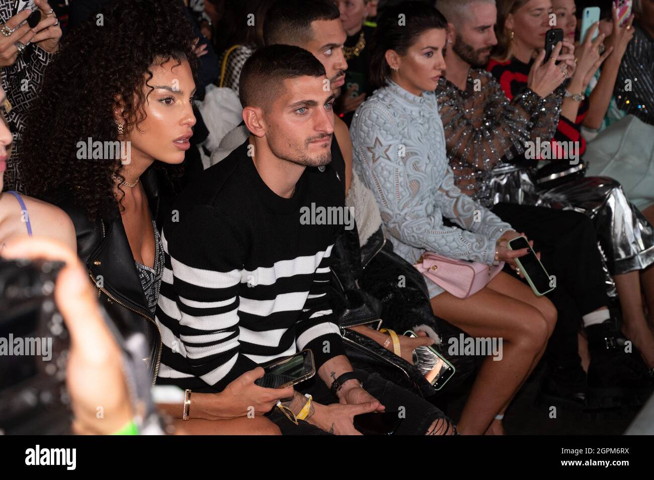 Marco Verratti and his wife Jessica Aidi attend the Balmain Festival as