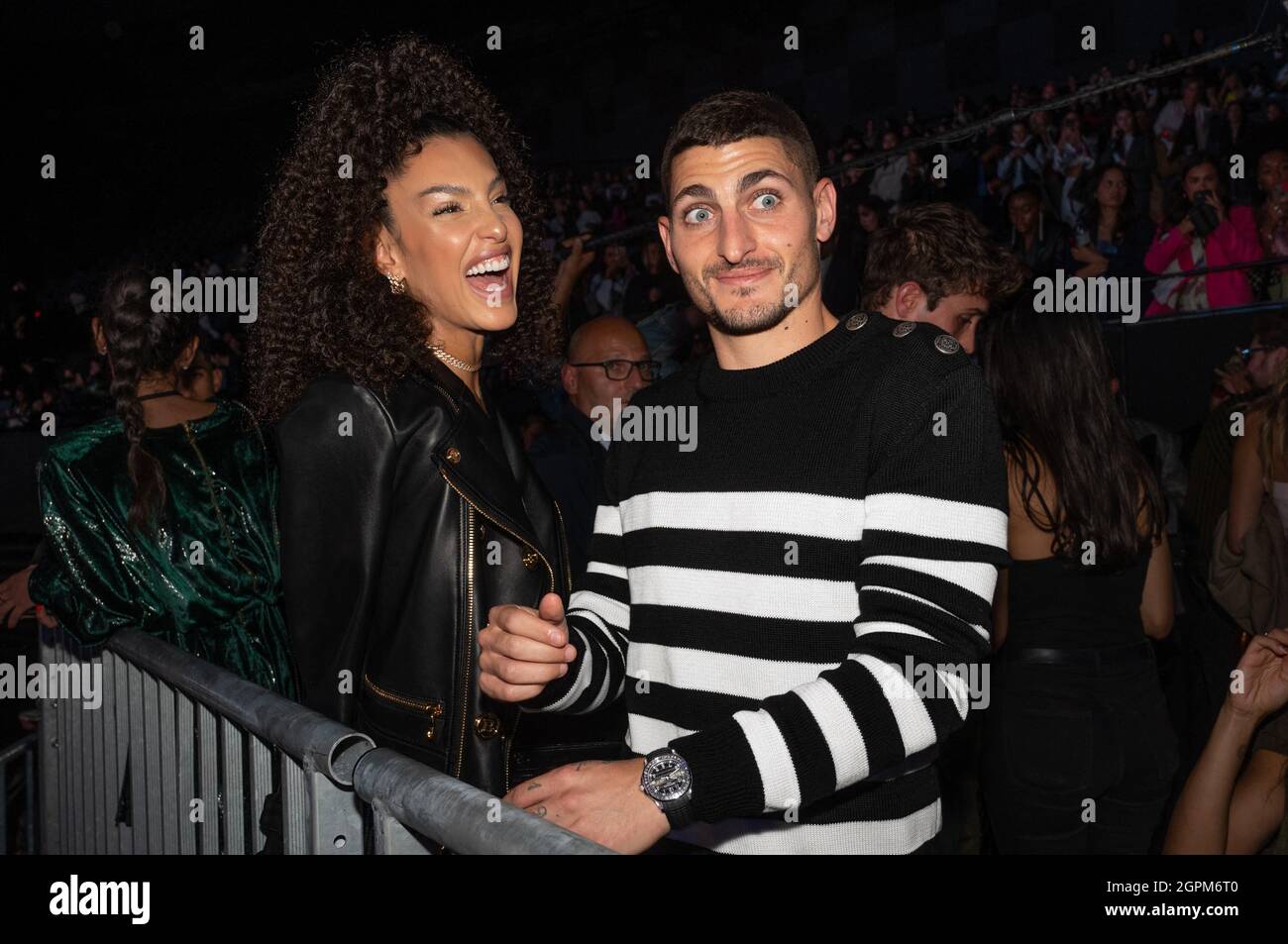 Marco Verratti and his wife Jessica Aidi attend the Balmain Festival as