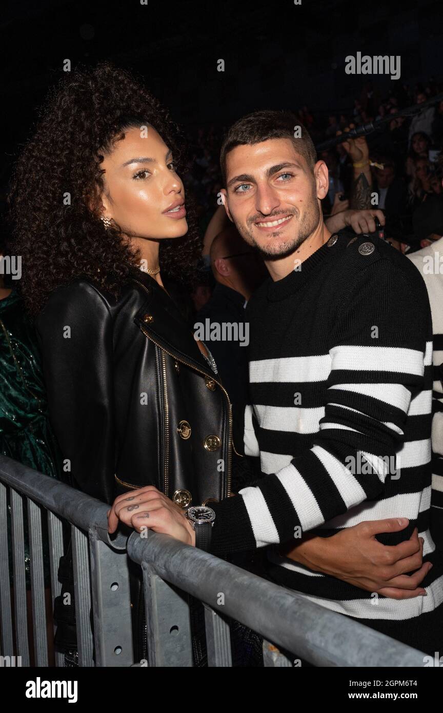 Marco Verratti and his wife Jessica Aidi attend the Balmain Festival as