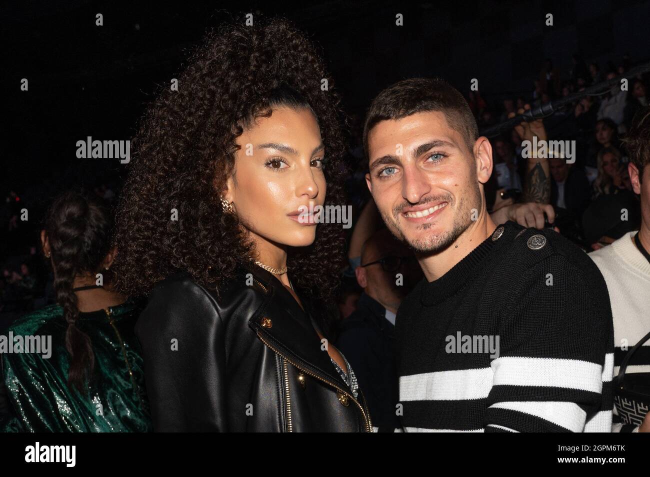 Marco Verratti and his wife Jessica Aidi attend the Balmain Festival as