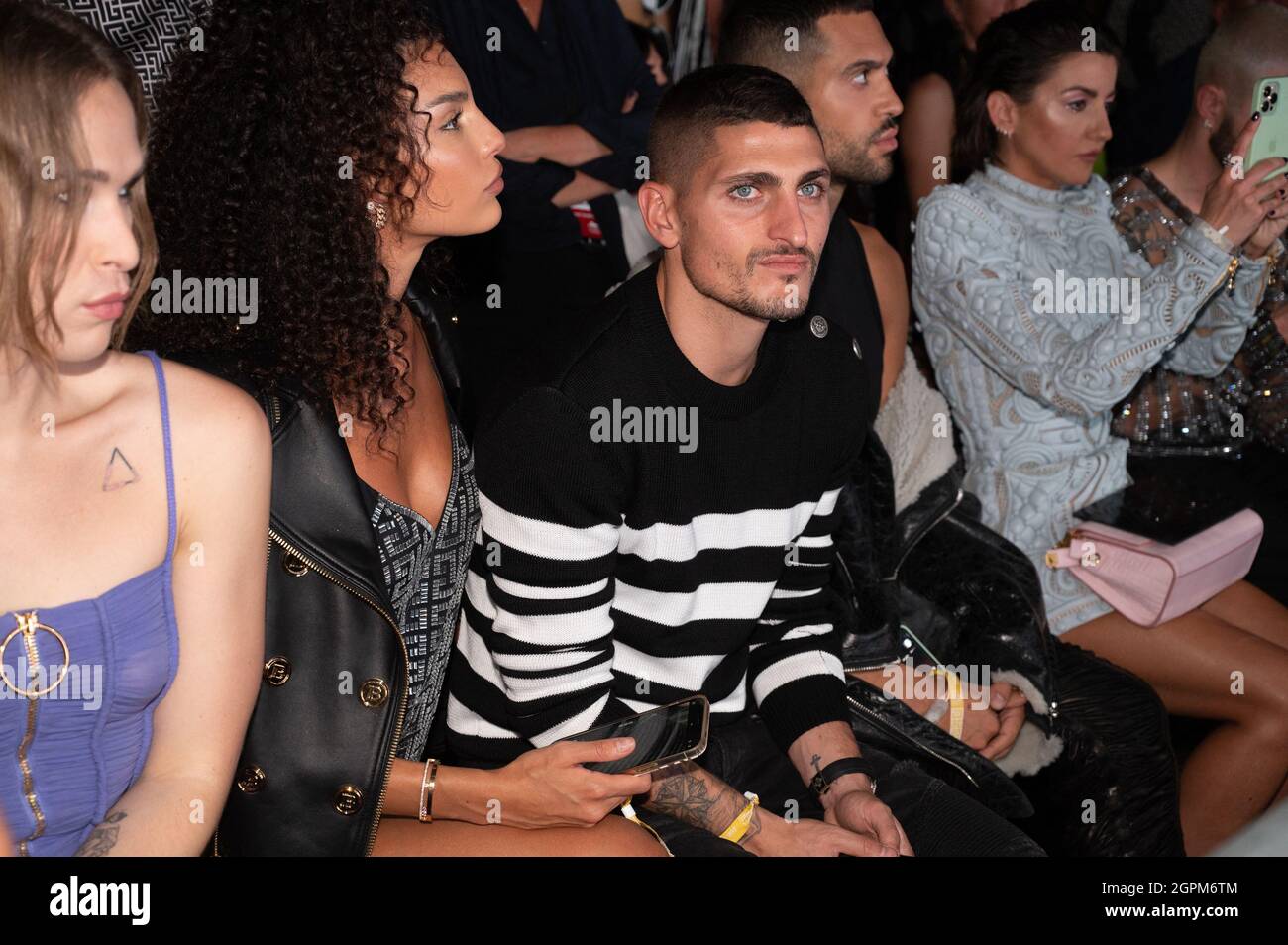 Marco Verratti and his wife Jessica Aidi attend the Balmain Festival as