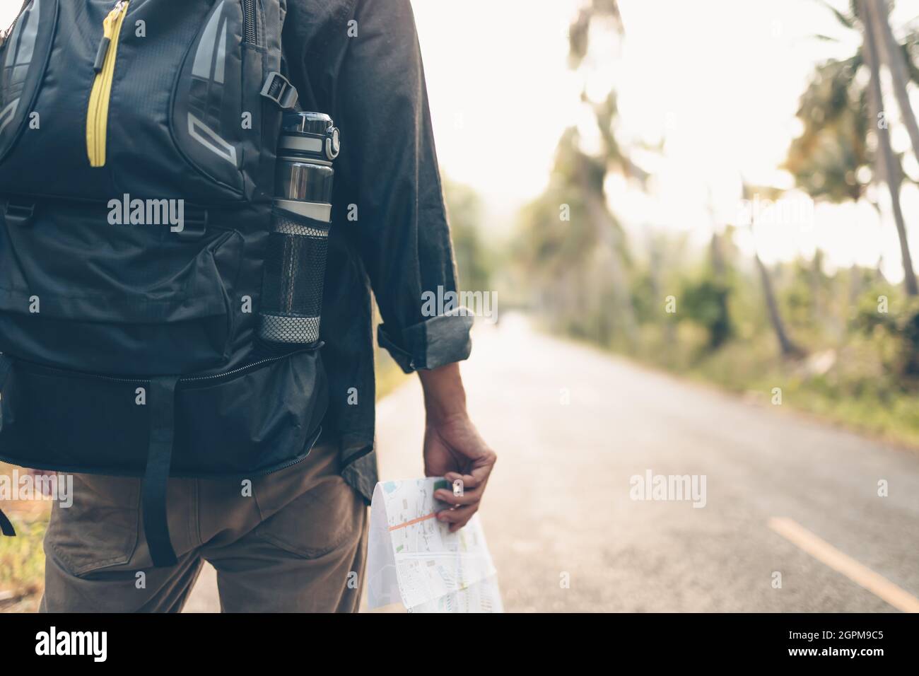Male explorer backpack walking hi-res stock photography and images - Alamy
