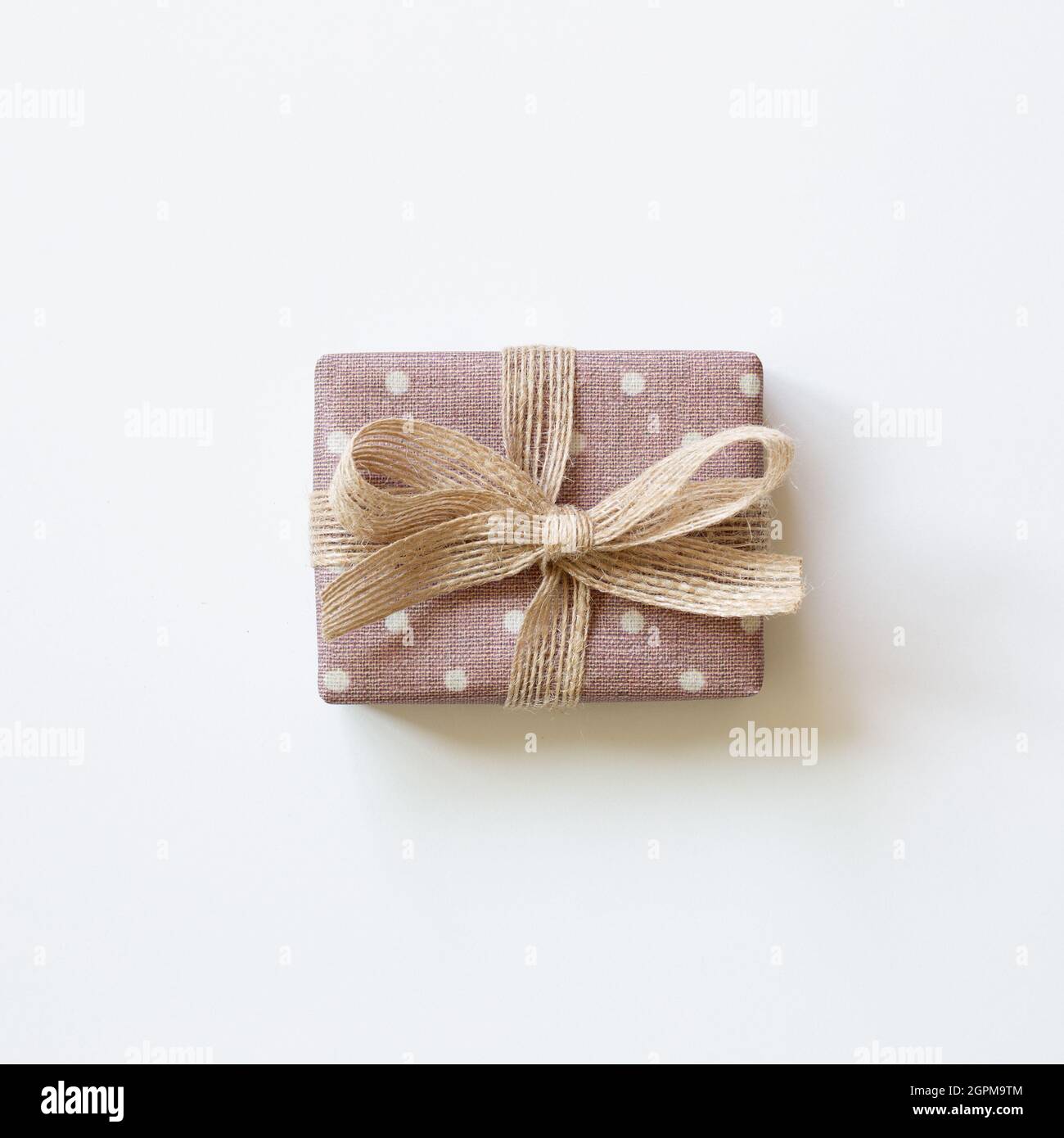 Pink dot pattern gift box isolated on white background. top view, copy space Stock Photo