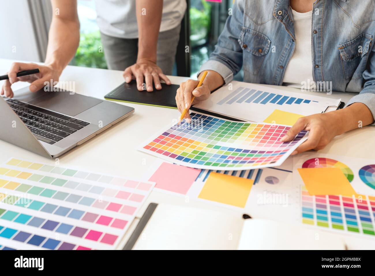 two designers discussing on the color tone for the excellent visual ...