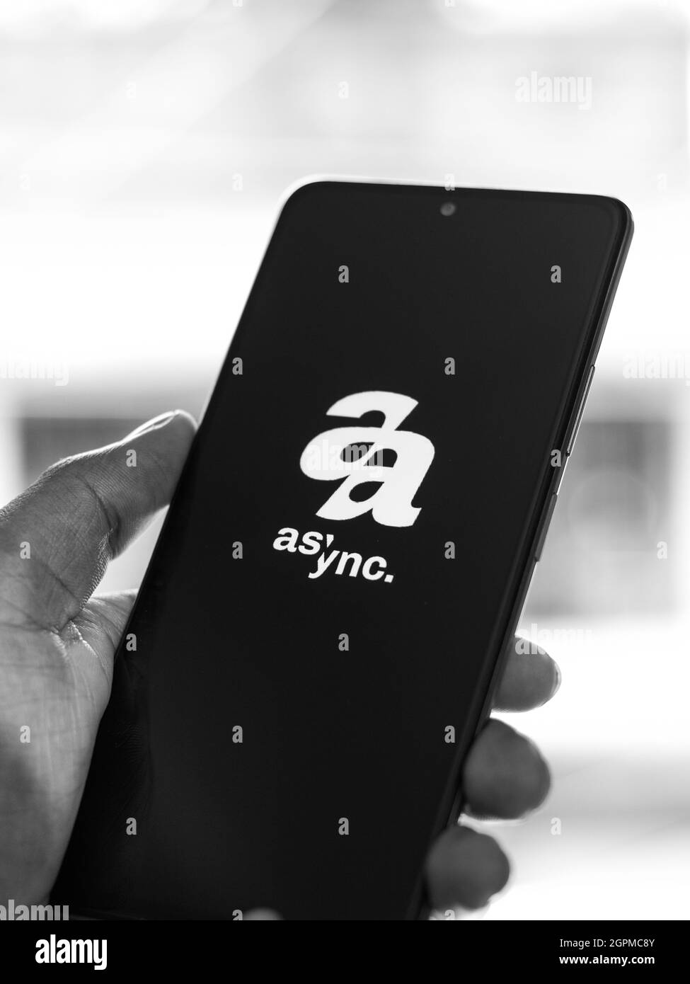 West Bangal, India - September 28, 2021 : Async art logo on phone screen stock image. Stock Photo