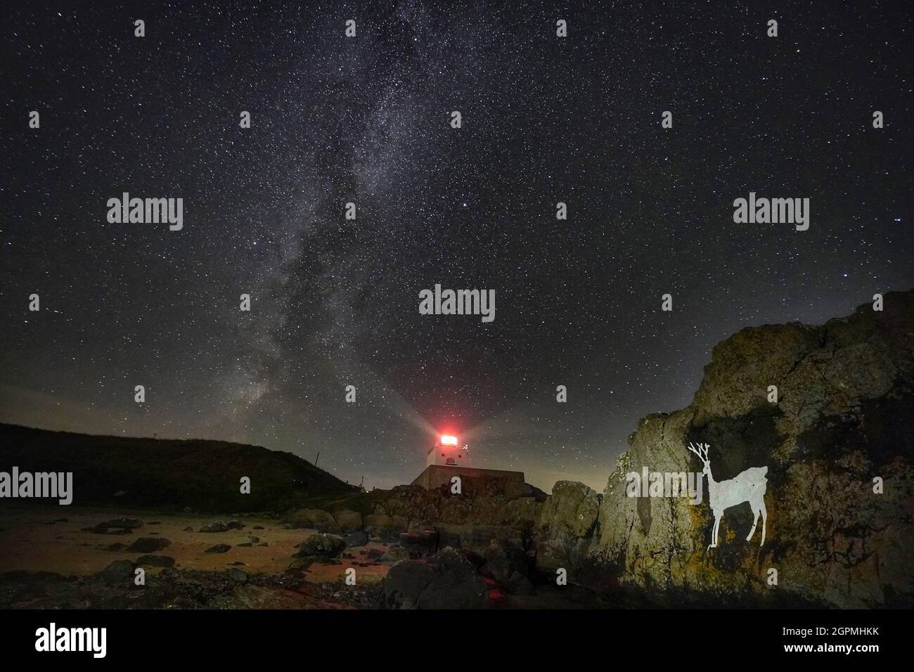 The milky way over Bamburgh Lighthouse and Stag Rocks, in Bamburgh ...