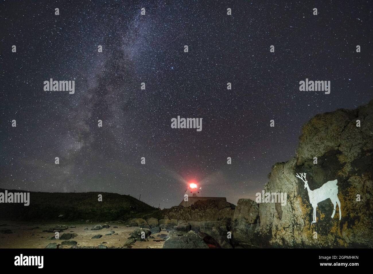 The milky way over Bamburgh Lighthouse and Stag Rocks, in Bamburgh ...