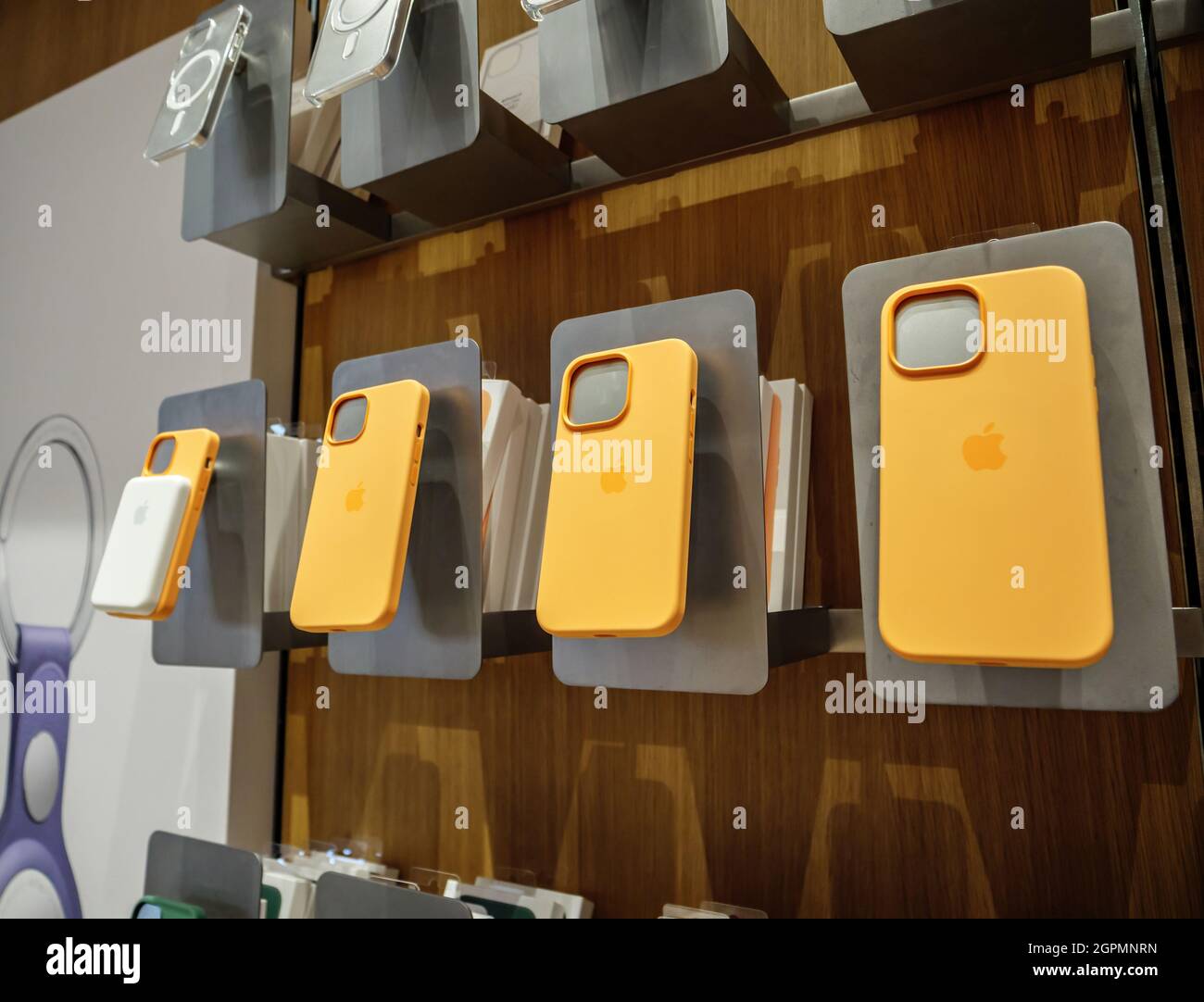 Orange yellow silicone protection cases of iPhone 13 Pro at the Apple Store  as latest new 5G iPhone 13, 13 Pro Stock Photo - Alamy