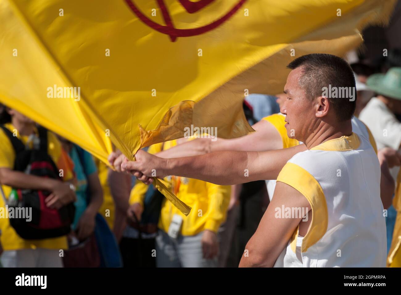 Practitioners of Falun Gong gather  for a celebration in Tsim Sha Tsui, Kowloon, Hong Kong Stock Photo