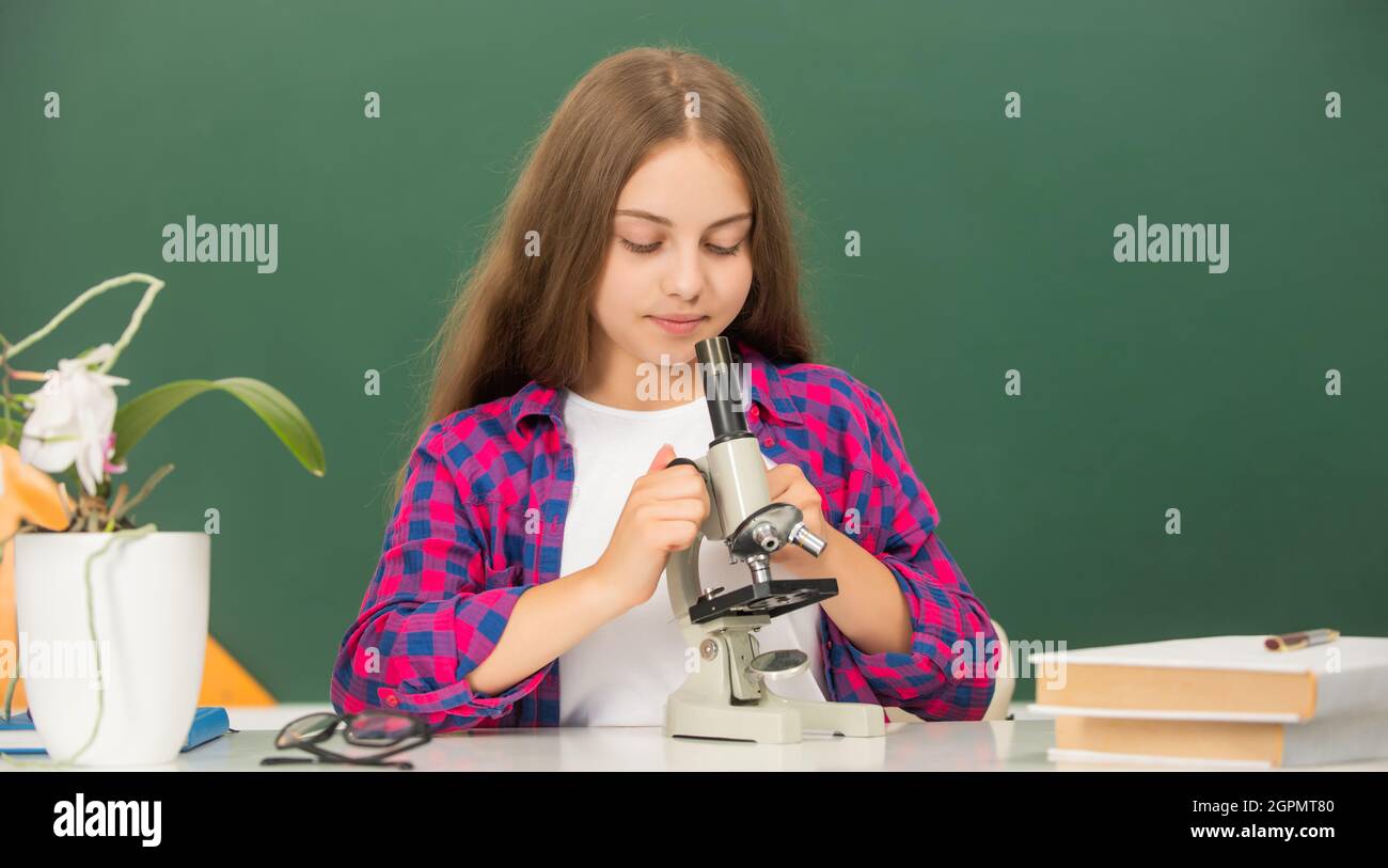 future scientist kid with scope. harness scientific method. science and