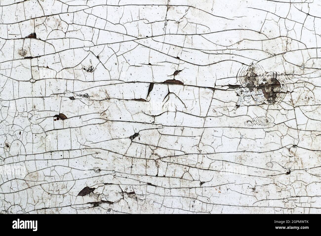 Detail of the fine cracks on the surface, cracked texture Stock Photo