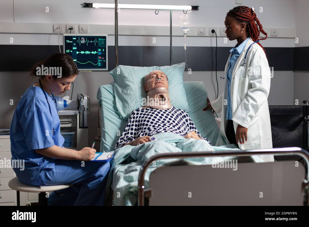 Injured senior man with neck brace laying in bed suffering after