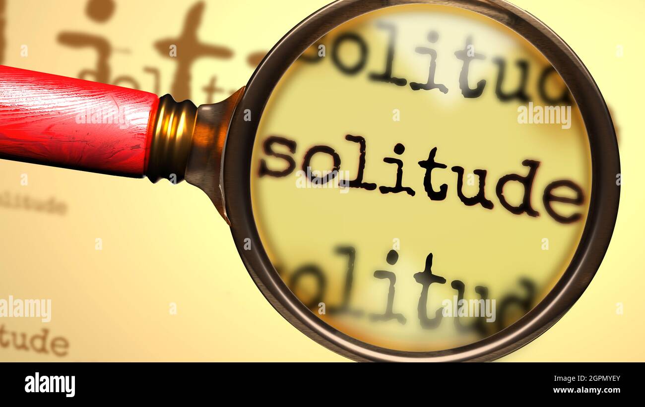 Solitude and a magnifying glass on English word Solitude to symbolize studying, examining or searching for an explanation and answers related to a con Stock Photo