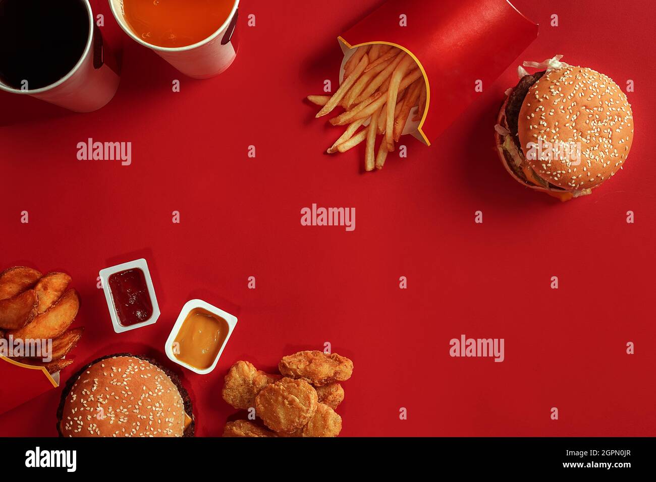 Burger and Chips. Hamburger and french fries in red paper box. Fast