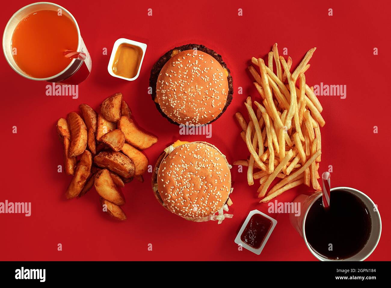 Burger and Chips. Hamburger and french fries in red paper box. Fast