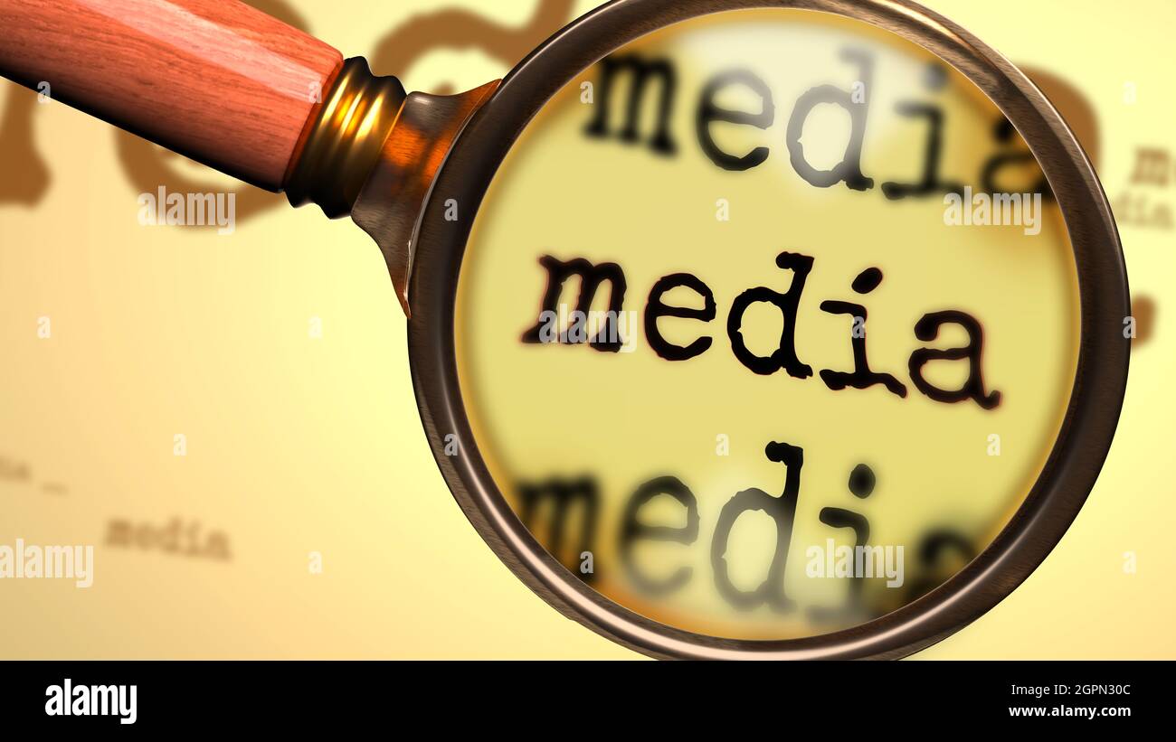 Media abstract concept and a magnifying glass enlarging English word