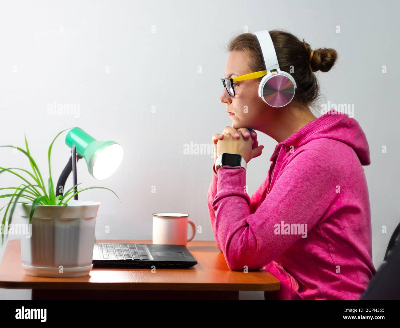 Female freelancer in headphones laptop Work from home, distance e ...