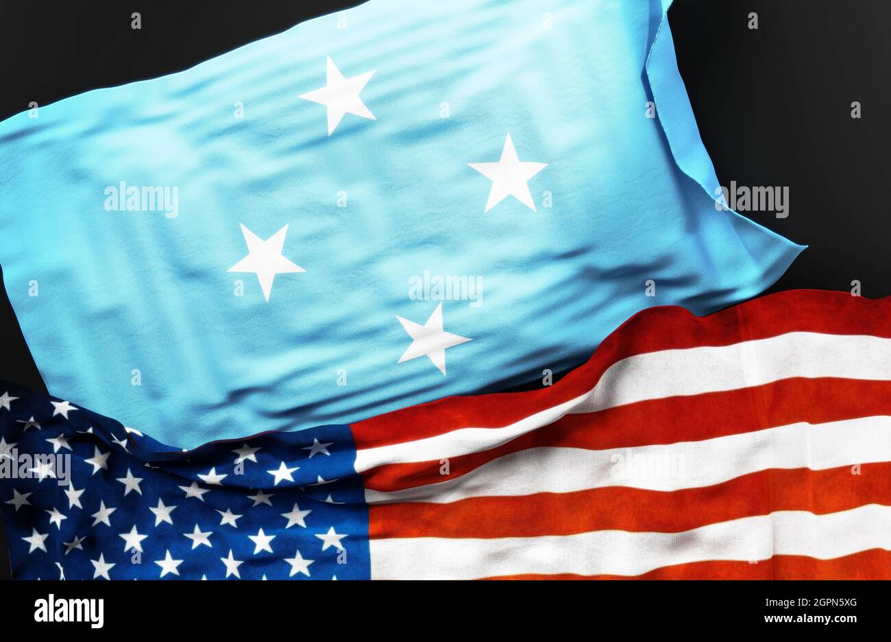 Flag of the Federated States of Micronesia along with a flag of the United States of America as a symbol of unity between them, 3d illustration Stock Photo