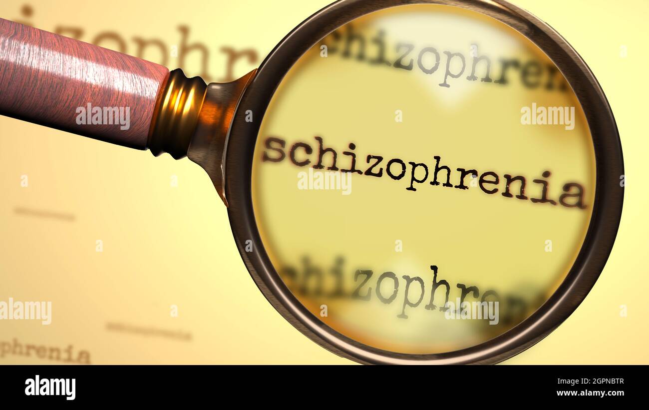 Schizophrenia and a magnifying glass on English word Schizophrenia to symbolize studying, examining or searching for an explanation and answers relate Stock Photo