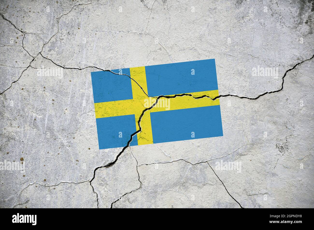 An image of the flag of Sweden on a wall with a crack Stock Photo - Alamy