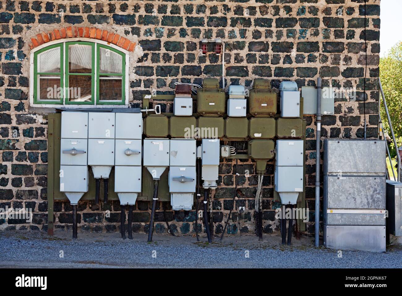 Umea, Norrland Sweden - June 8, 2021: electrical madness on an old house facade Stock Photo