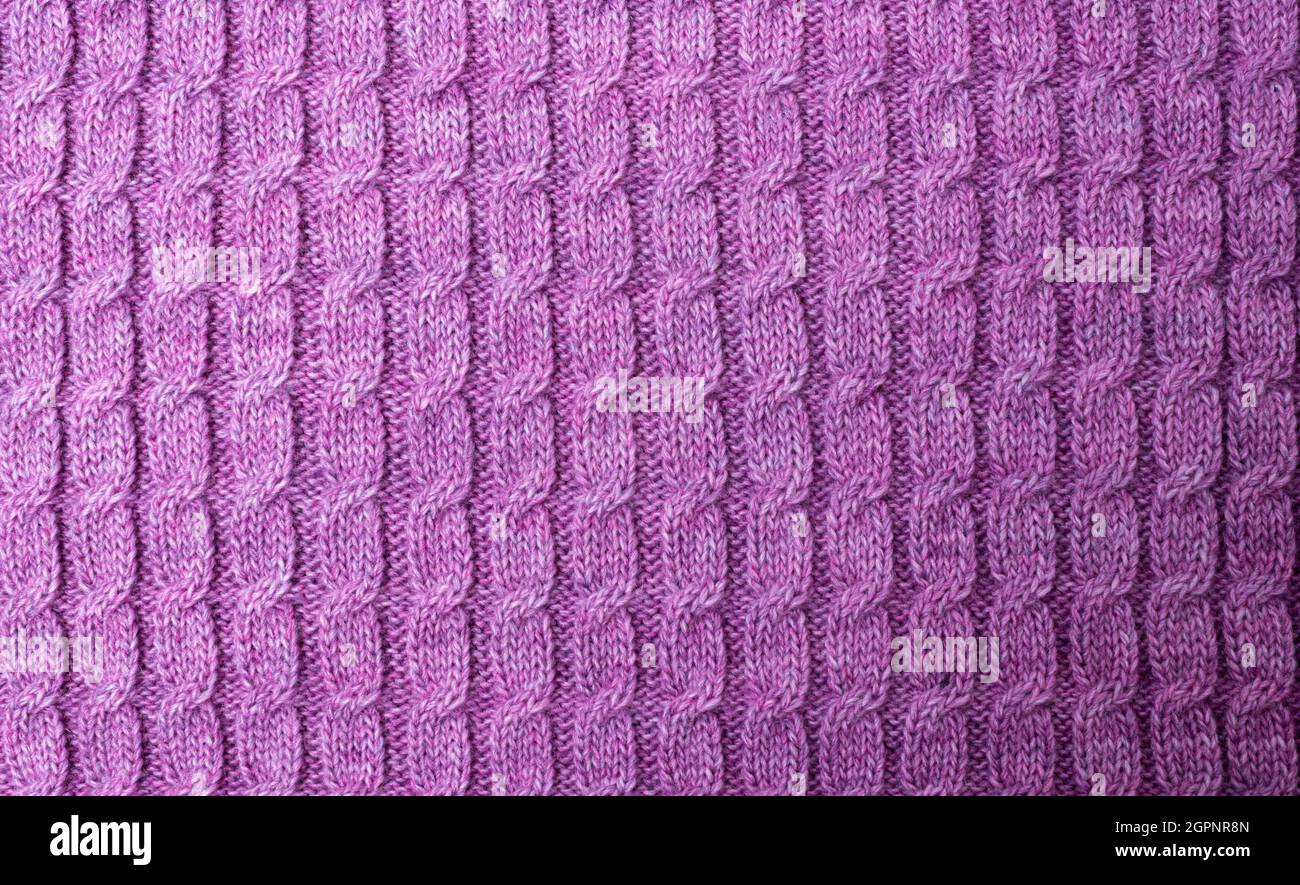 Purple knit fabric pattern as background Stock Photo