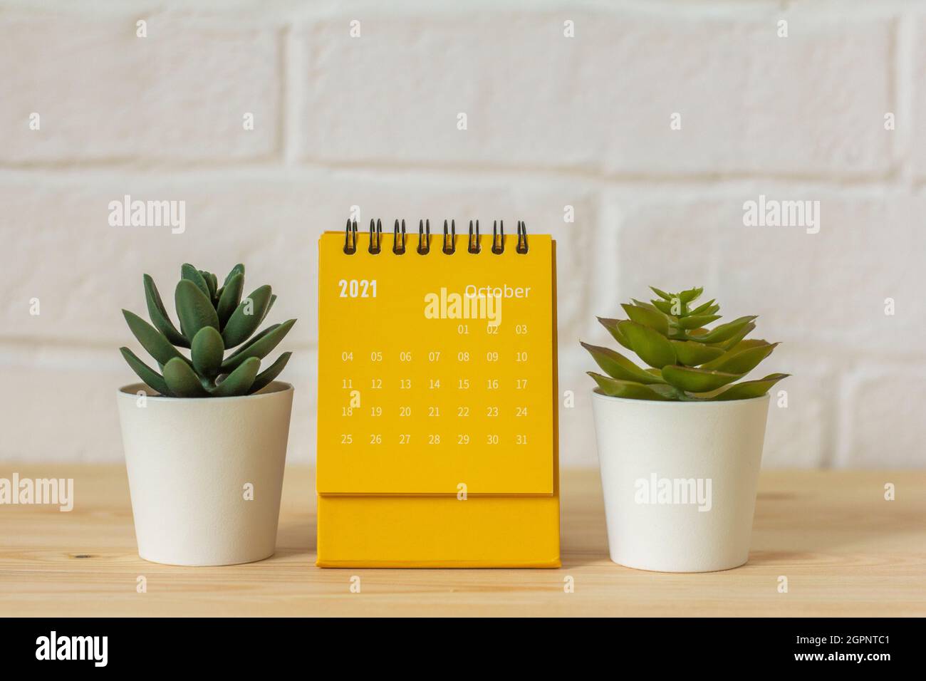 Calendar with tearoff sheets for October 2021. A desktop calendar for