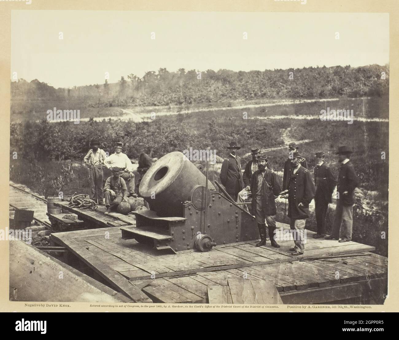 Mortar Dictator, in Front of Petersburg, October 1864. [Scene from the American Civil War: Union army soldiers with 13 inch mortar &quot;Dictator&quot;]. Albumen print, pl. 75 from the album &quot;Gardner's Photographic Sketch Book of the War, volume ii&quot; (1866). Stock Photo