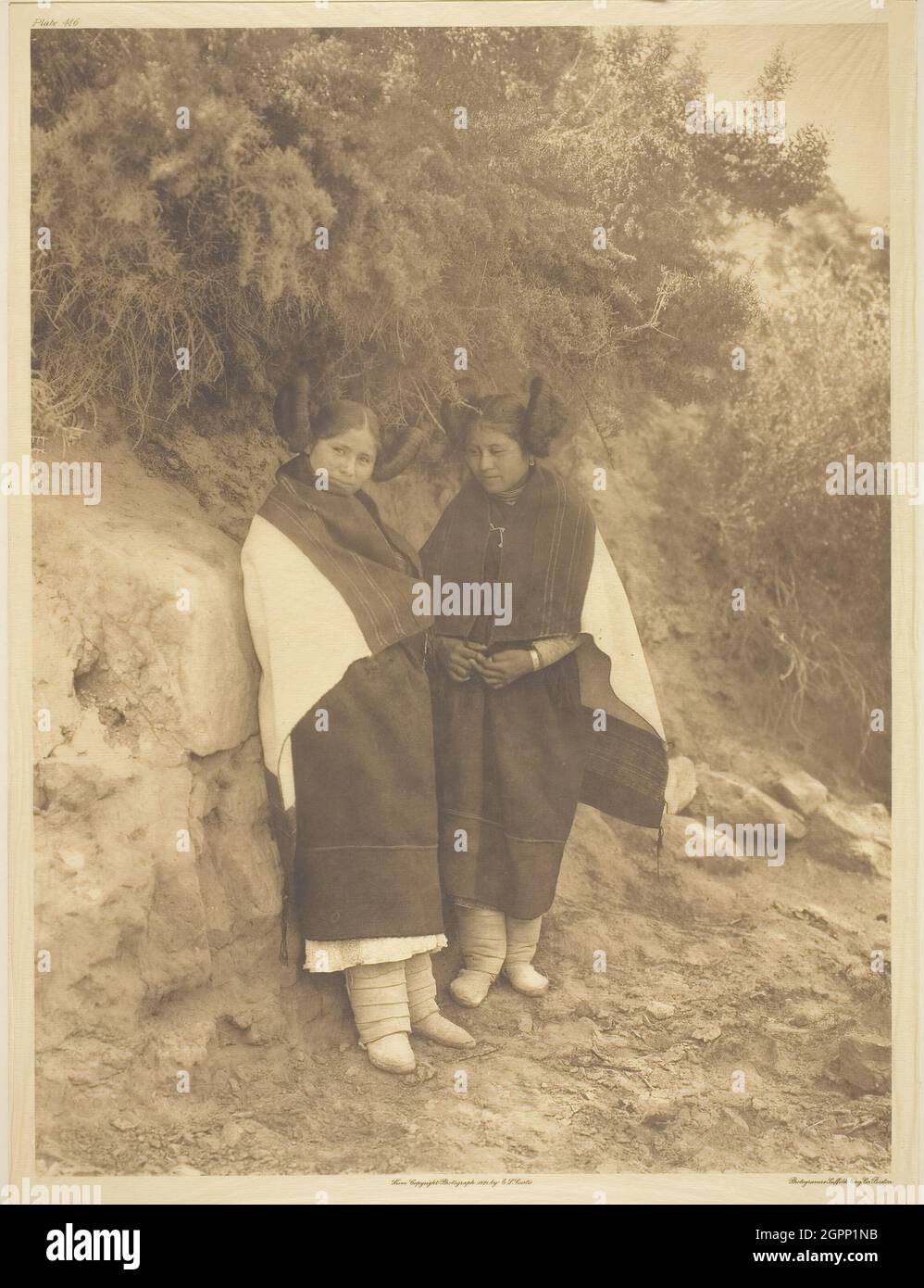 At the Trysting Place, 1921. [Young Native American women from the southwestern United States]. Photogravure, plate 416 from &quot;The North American Indian, volume 12&quot; (1922). Stock Photo