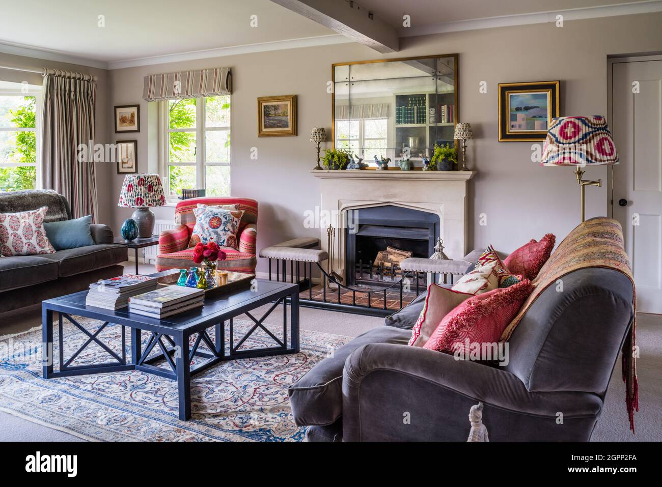 Velvet sofa and coffee table in Hampshire farmhouse, UK Stock Photo