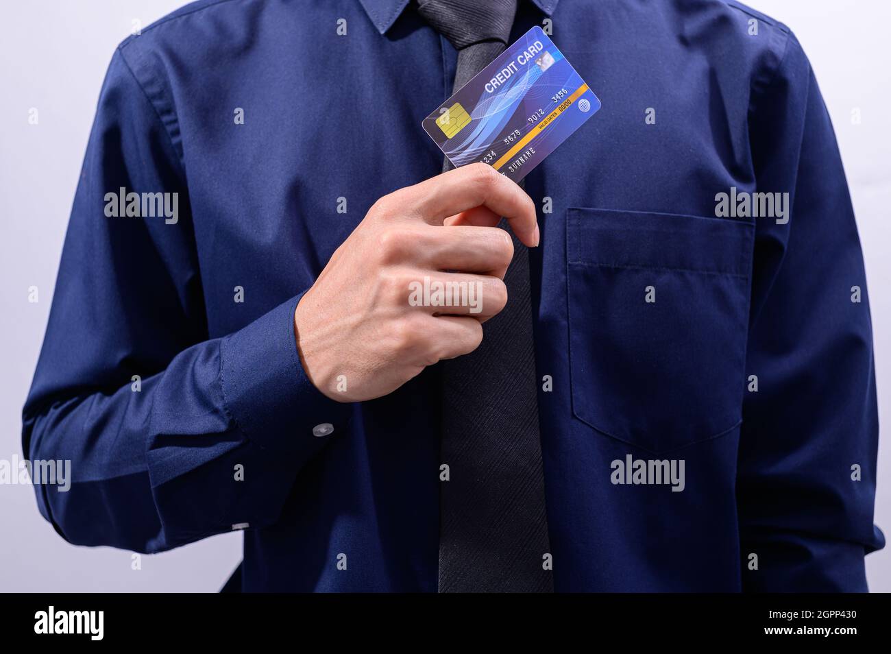 Business people hold credit cards Stock Photo - Alamy