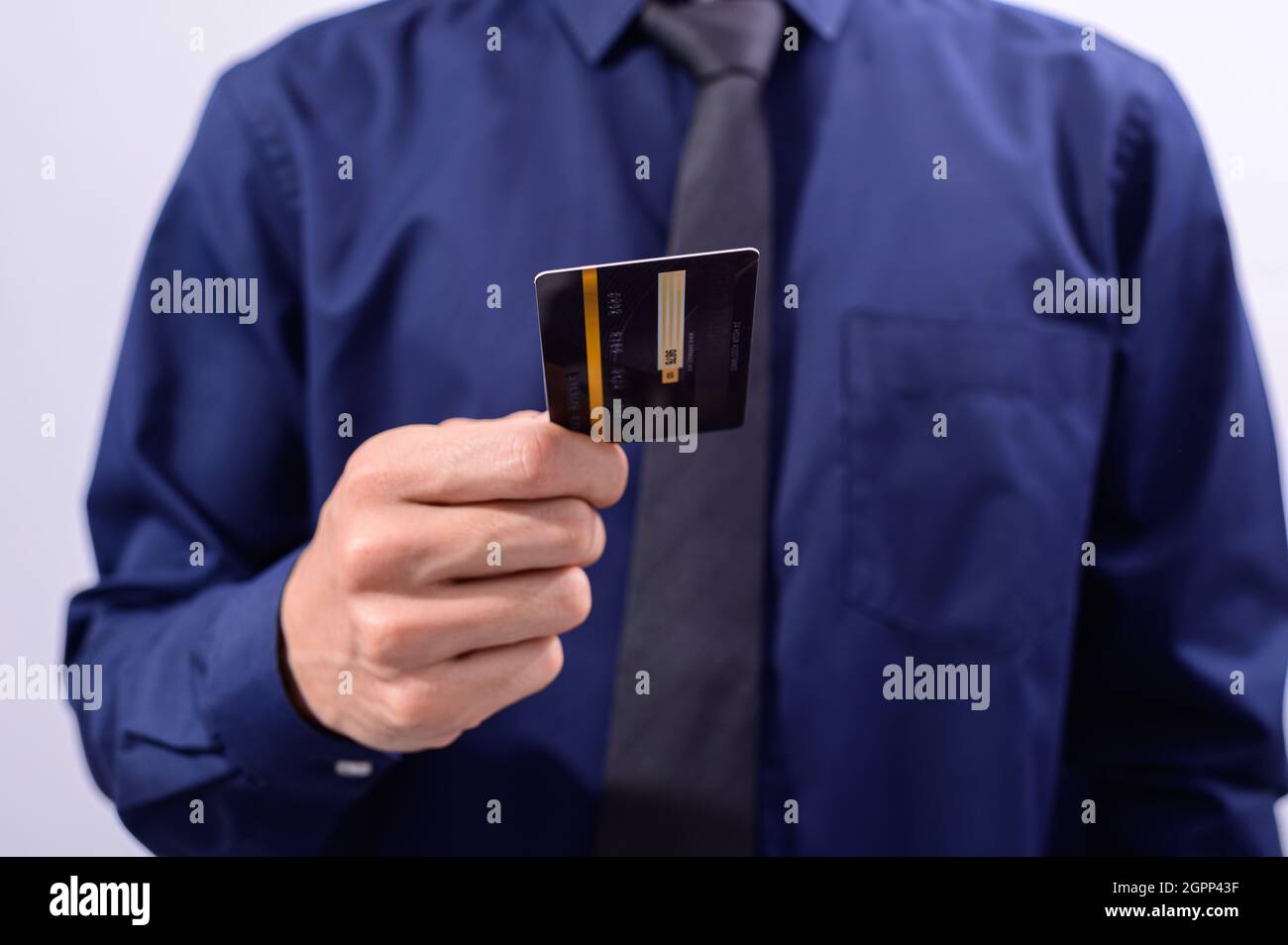 Business people hold credit cards Stock Photo - Alamy