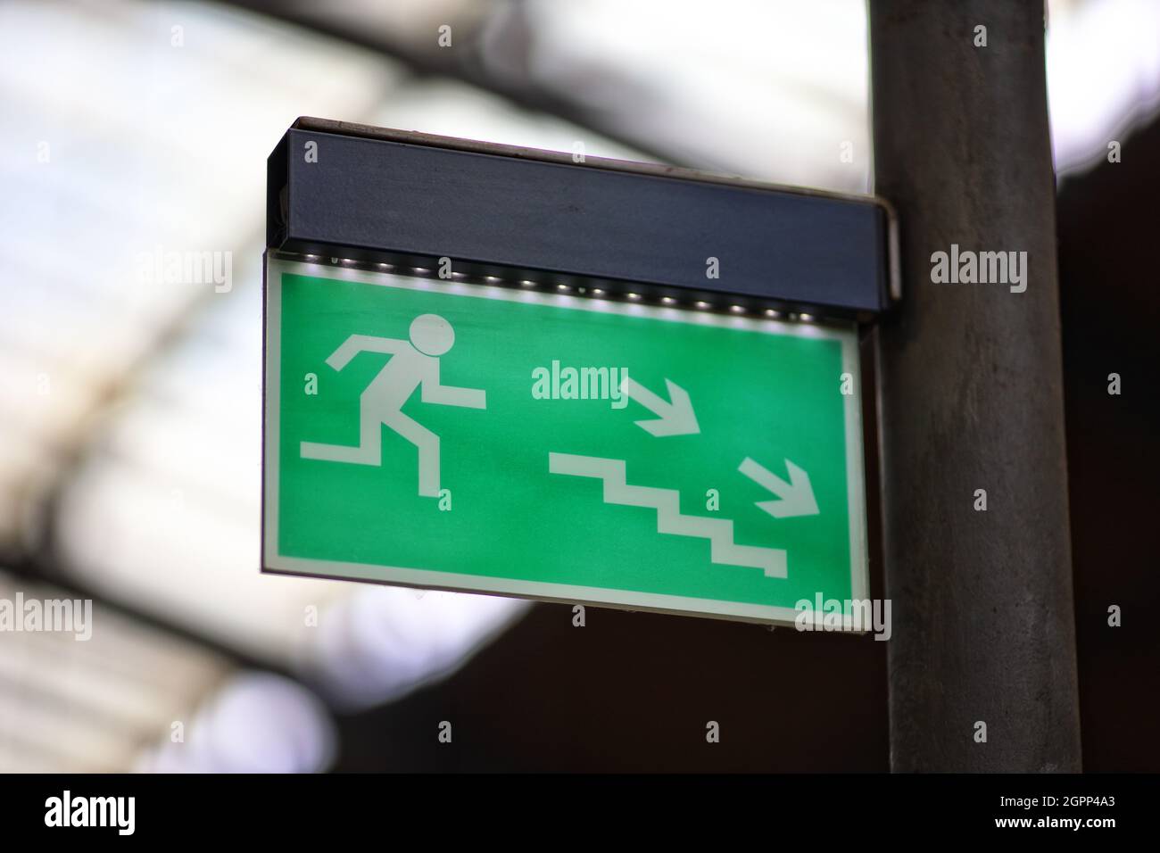 Emergency exit sign on street Stock Photo