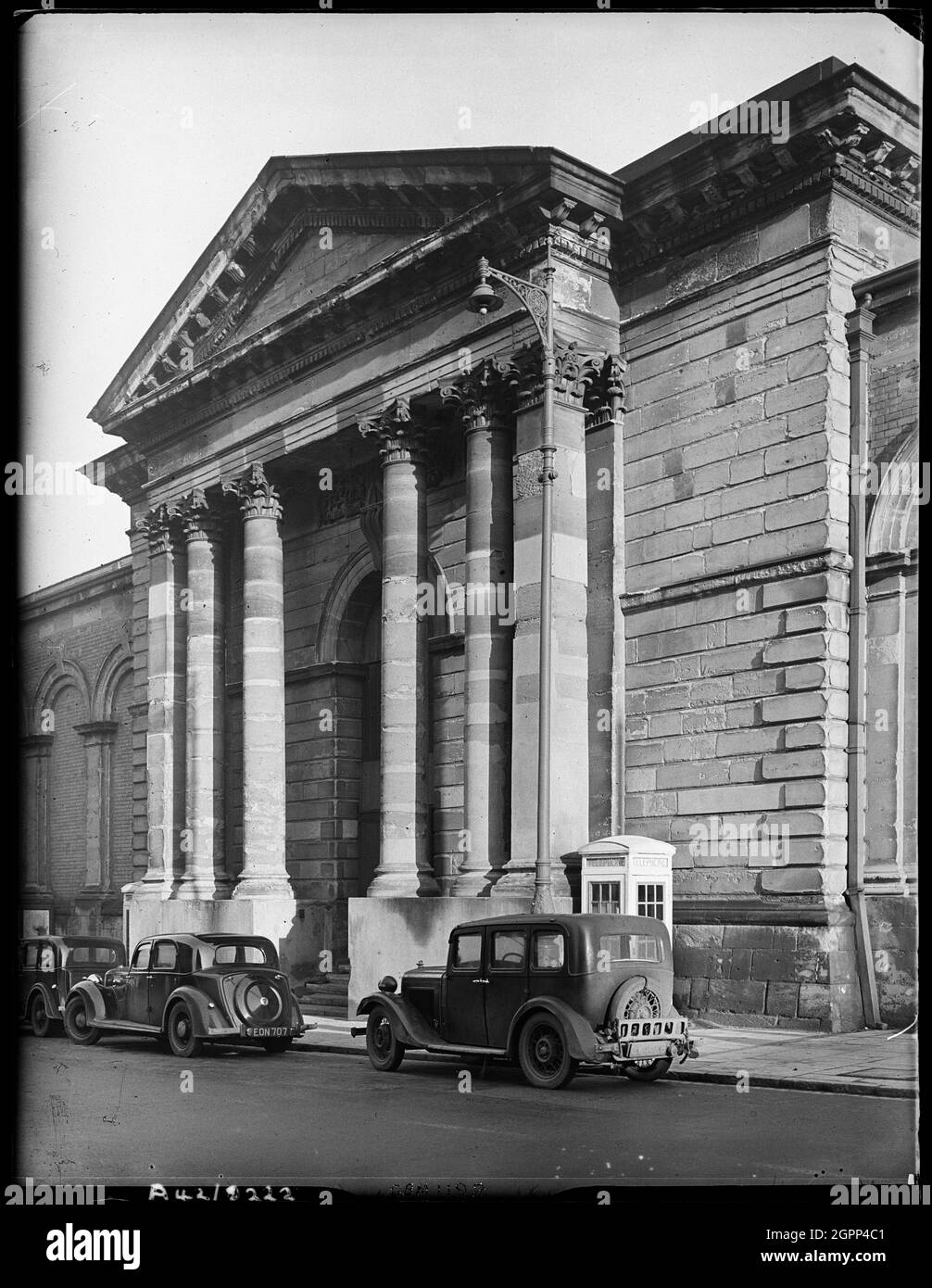 Market Hall, North Street, Wolverhampton, Spring 1942. The west portico of the Market Hall in North Street. The Market Hall opened in 1853. By 1868 it was described as 'being the worst conducted market hall in England' with stall holders complaining of a lack of enforcement of bye laws and a prevalence of pick-pockets. Over the subsequent years the situation improved, thanks in part to the presence of police officers, and the market went from strength to strength. It finally closed in 1960 after concerns that repairs would prove too costly. The Civic Centre now occupies the site. Stock Photo