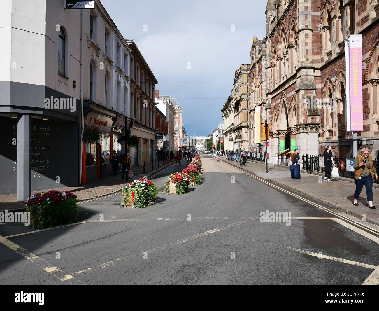 Temporary changes in a road layout, creating a one way system, to encourage social distancing, walking and cycling. Queen Street, Exeter, Devon UK Stock Photo