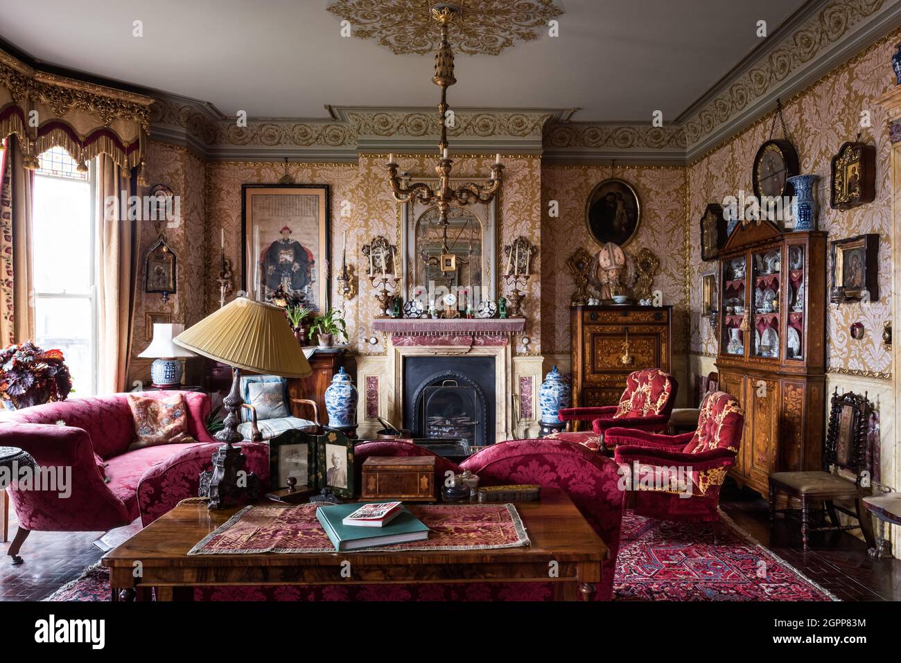 Layers of pattern and velvet furniture in Benedict's Victorian B&B, St LeonardsonSea Stock
