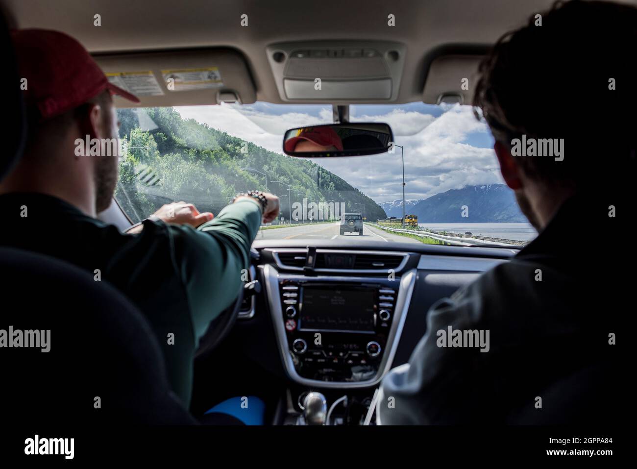 USA, Alaska, Rear view of two men in car in Kenai Fjords National Park Stock Photo