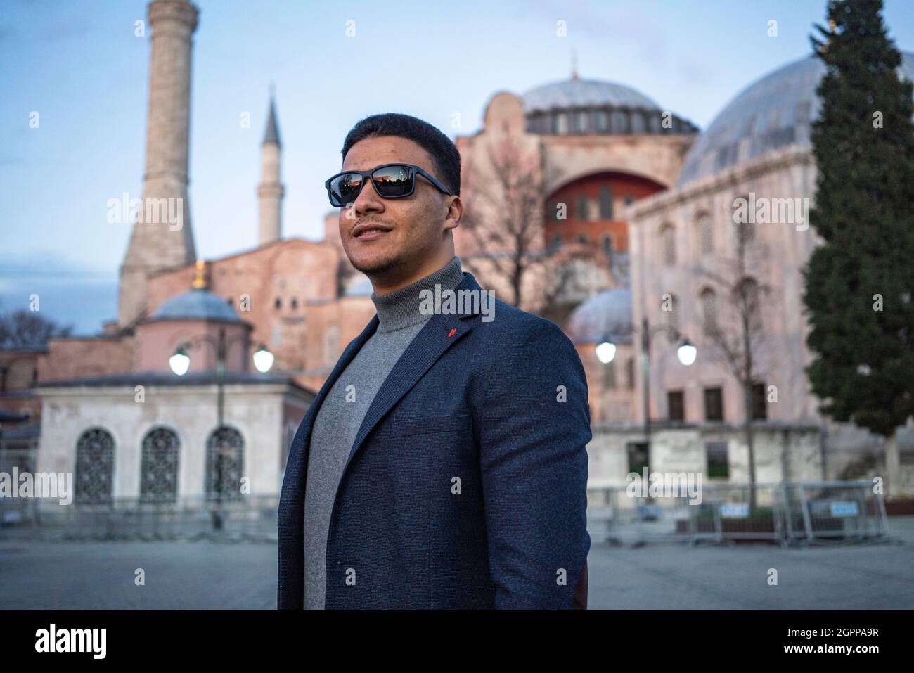 Turkey, Istanbul, Portrait of man in front of Hagia Sophia Stock Photo